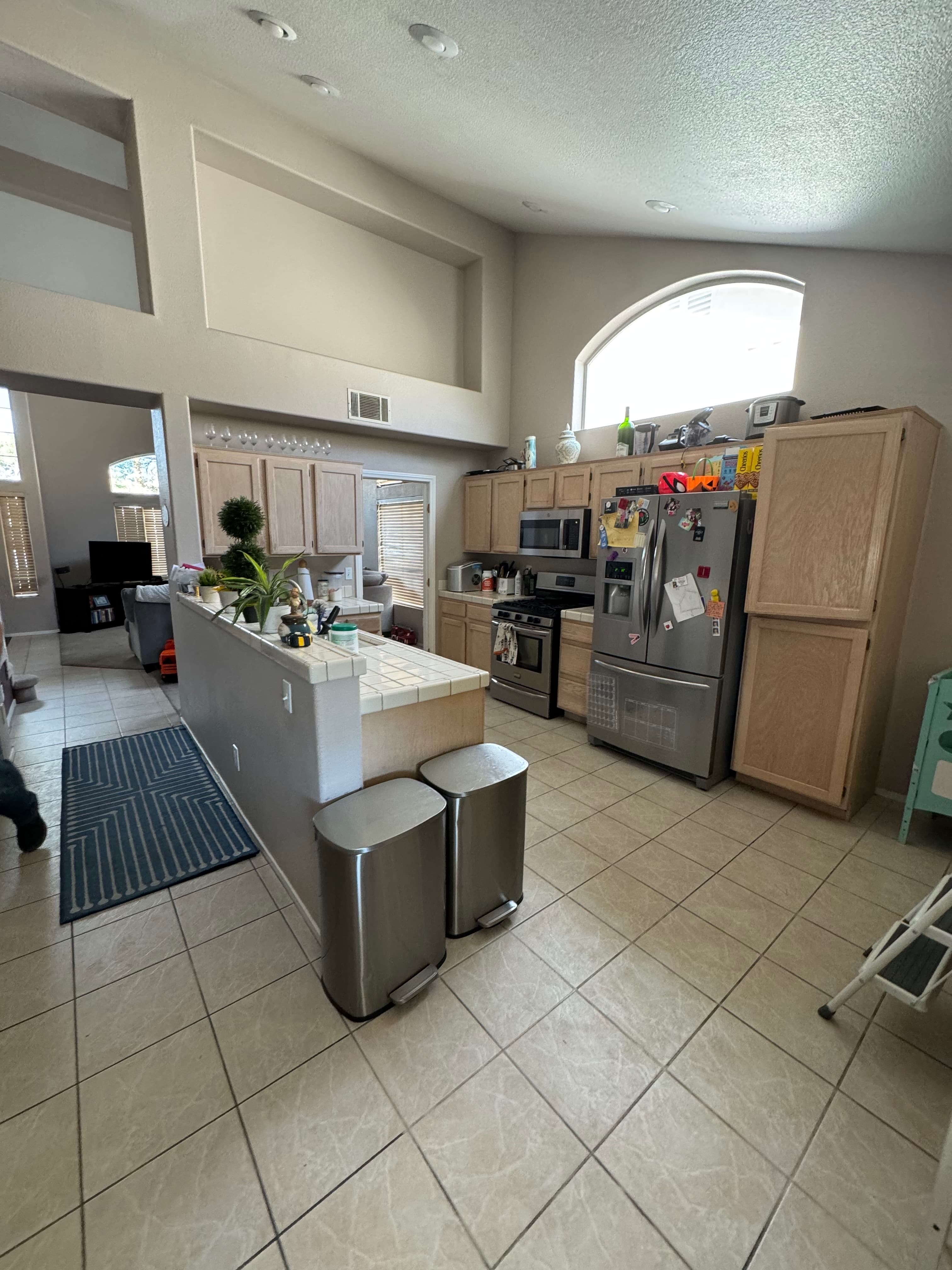 Before — dated kitchen, original layout